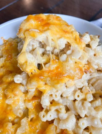 homemade mac and cheese being scoop up